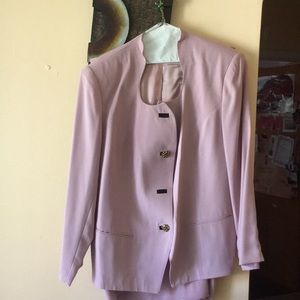 Pink 2 piece suit clean but 1 button missing